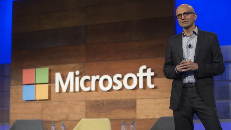 Microsoft climbs on earnings