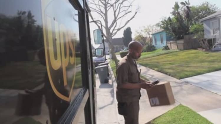 UPS delivers earnings miss