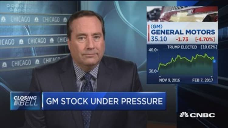 GM under pressure despite earnings beat