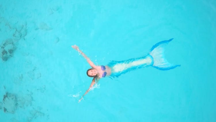 Meet a professional mermaid who charges $6,000 per appearance