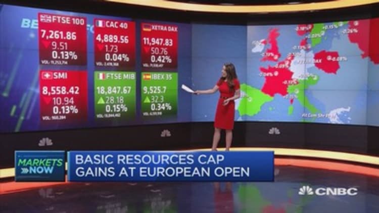 Europe markets open slightly lower; investors eye earnings and data