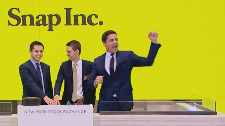 Snap founders ring opening bell before shares hit market