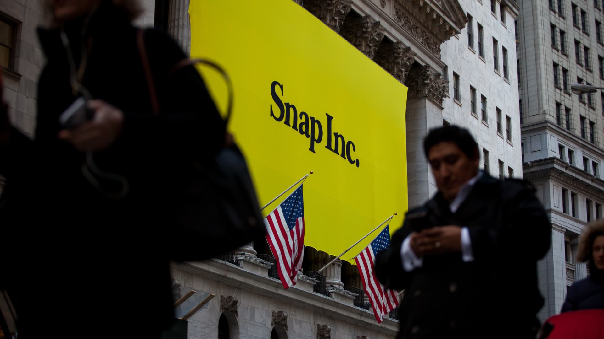 Nasdaq falls as Snap plunges, but is still headed for a strong weekly gain