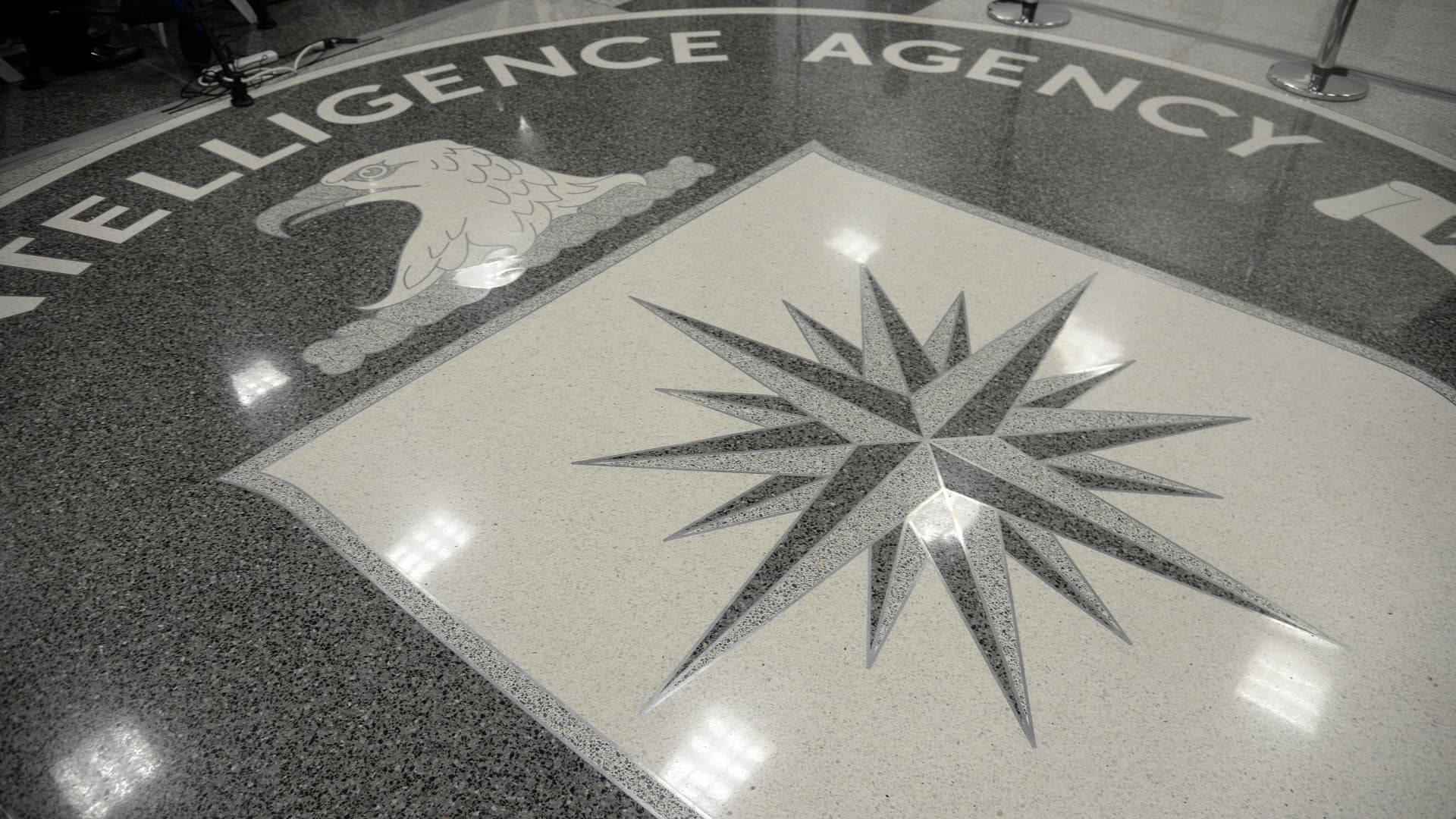 The logo of the CIA is seen during a visit ofUS President Donald Trump the CIA headquarters on January 21, 2017 in Langley, Virginia .