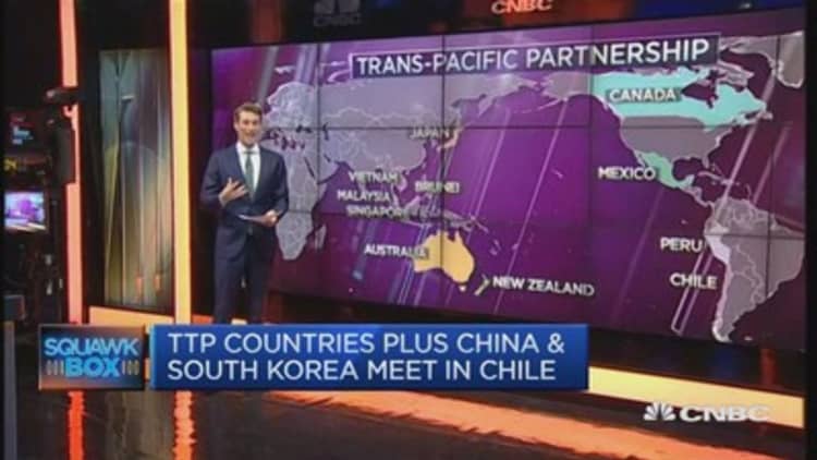 Why is China attending a meeting with TPP members?