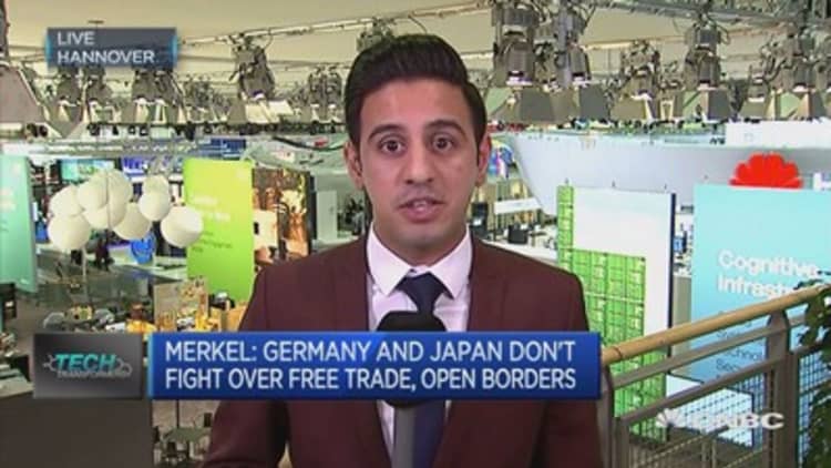 Abe, Merkel talk up free trade at CeBIT