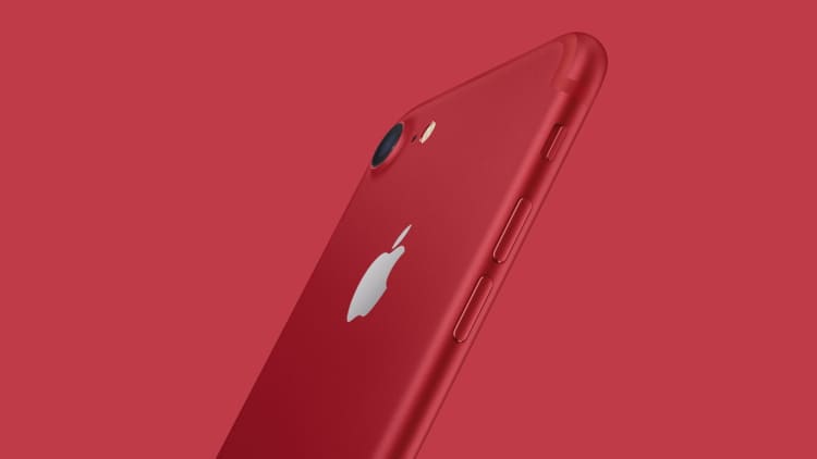 Apple launches red iPhone, cheaper iPad