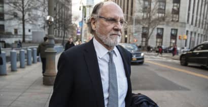 Corzine's bankrupt firm settles a long-running legal fight with PwC