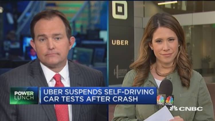 Uber suspends self-driving cars after Arizona crash