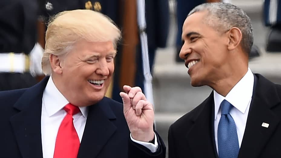 President Donald Trump and former President Barack Obama talk on the East steps of the US Capitol after inauguration ceremonies on January 20, 2017, in Washington, DC.