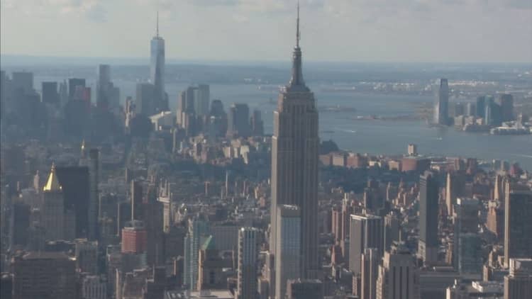 Manhattan property prices come down