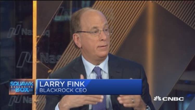 Larry Fink: We are not substituting machines for human 
