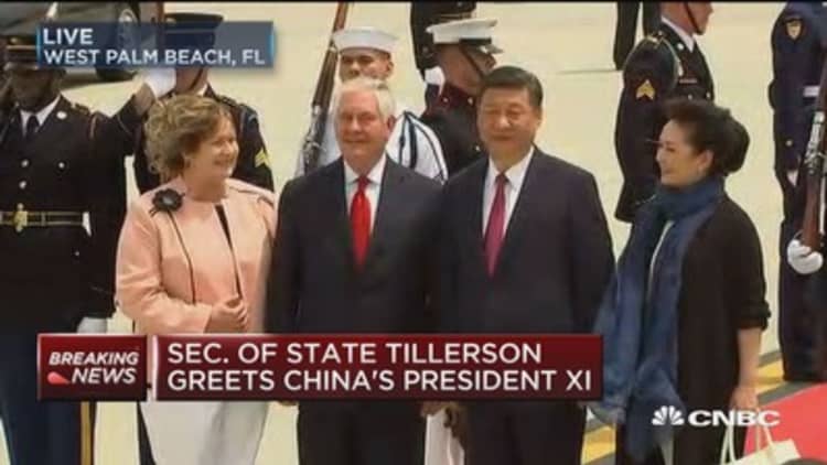 Treasury Secretary Tillerson greets Chinese President Xi Jinping