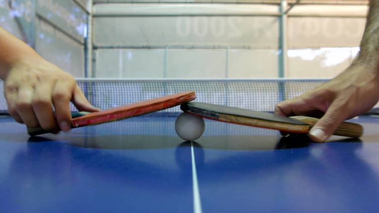 Why this self-made millionaire takes meetings while playing ping pong