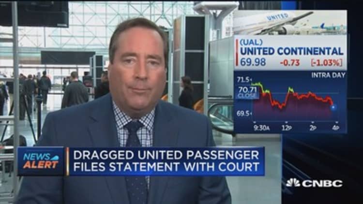 Dragged United passenger files statement with court