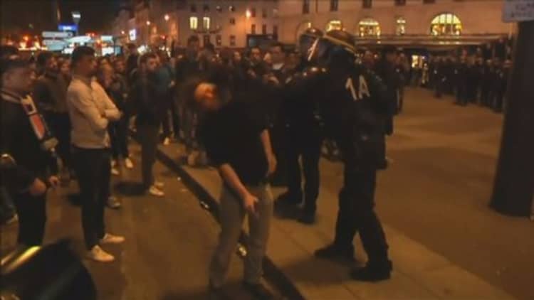 Protesters, police face off in Paris after election results announced