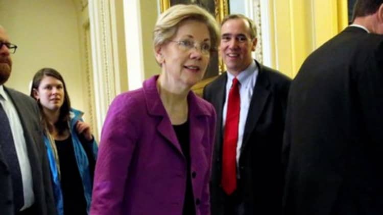 Elizabeth Warren says the system is more rigged than people think