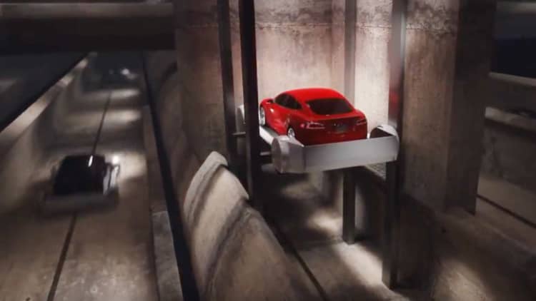 Elon Musk unveils The Boring Company's car elevator for superhighway project