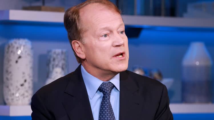 Why the former Cisco CEO says Big Tech is going through a 'midlife crisis'