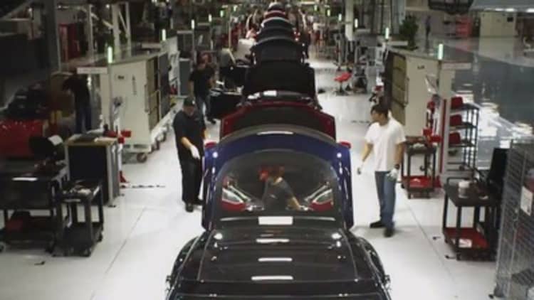 Tesla workers are passing out on the factory floor, according to a report