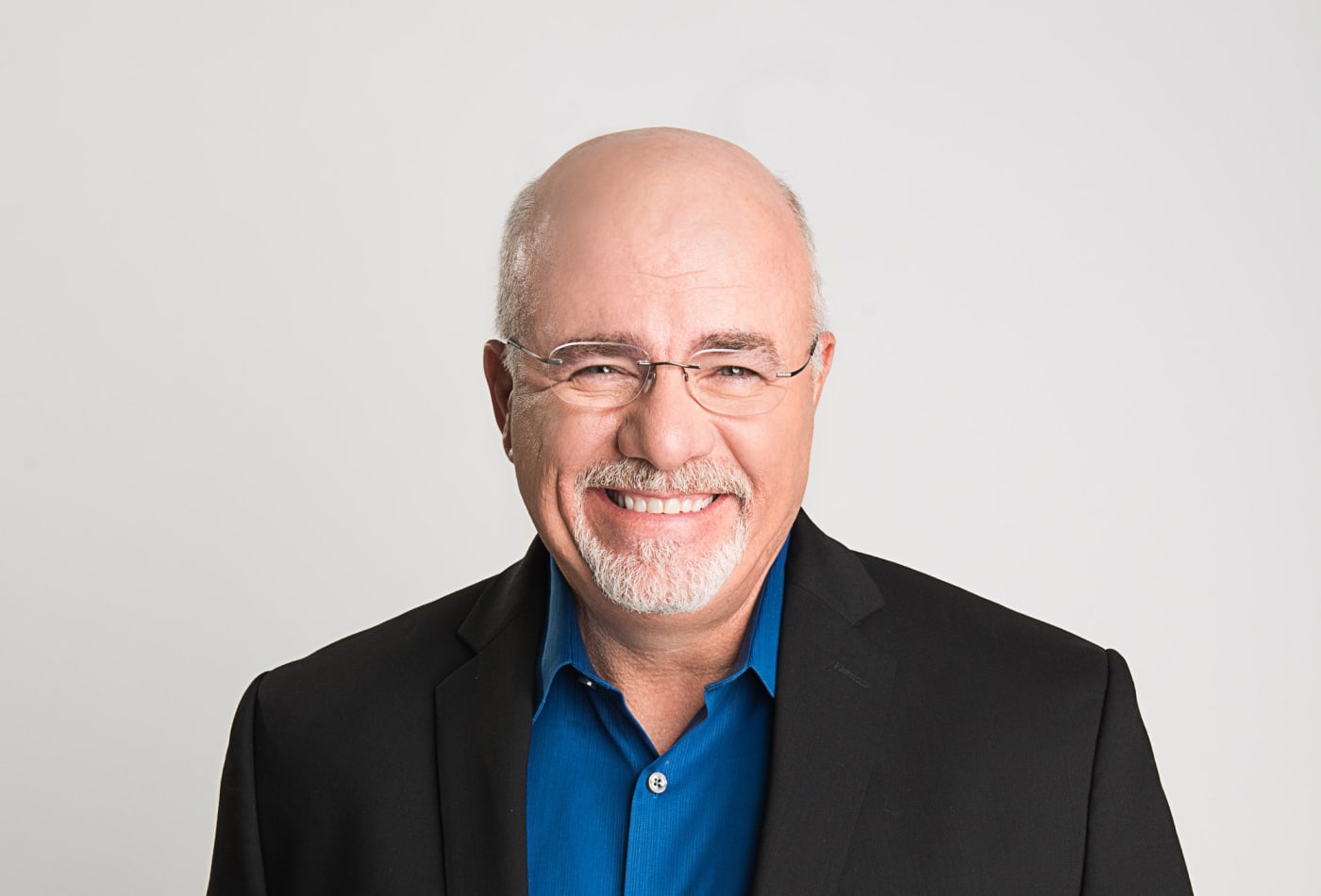 Why Dave Ramsey thinks you should keep living like 'a broke college kid'