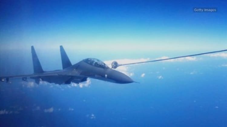 Two Chinese jets intercepted a U.S. military aircraft over the East China Sea