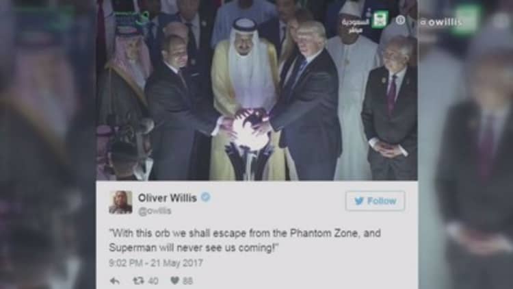 President Donald Trump stood in front of a glowing orb at the Global Center for Combating Extremist Ideology, sparking a series of Internet memes