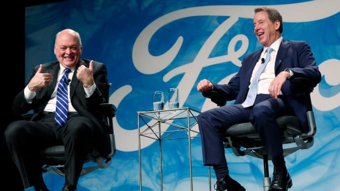 Jim Hackett, incoming chief executive officer of Ford Motor Co., left, and Bill Ford, executive chairman of Ford Motor Co., laugh during an event at the company's headquarters in Dearborn, Michigan, on Tuesday, May 22, 2017.