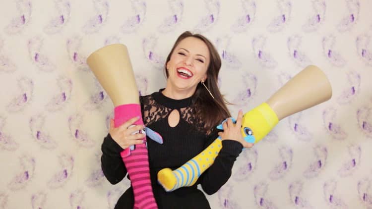 This CEO ran away with the circus, became a YouTube star and now she is selling socks with ears