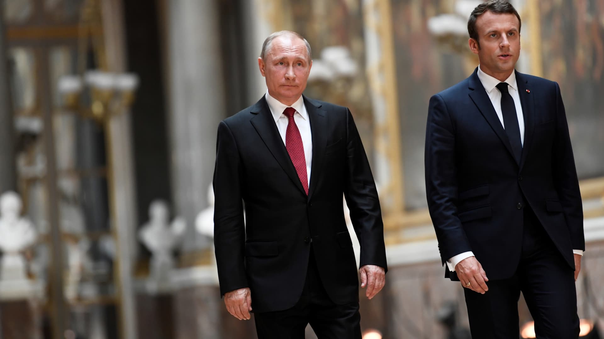 French President Emmanuel Macron, with Russian President Vladimir Putin, in Versailles on May 29, 2017.