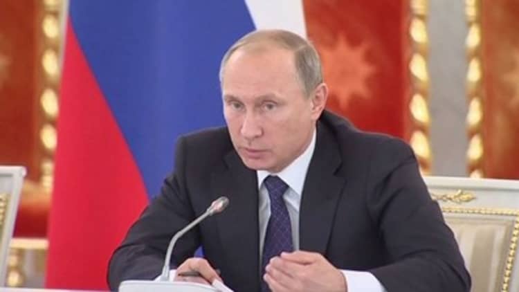 Patriotic Russians may have staged cyber attacks on their own initiative, says Putin