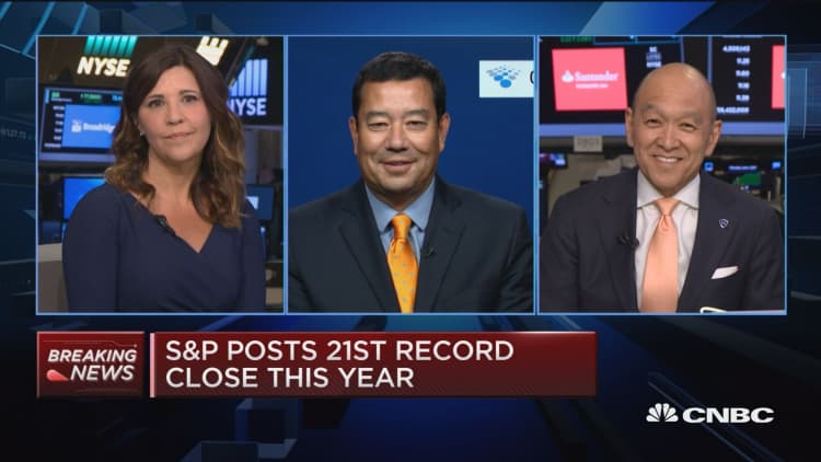 S&P posts 21st record close this year