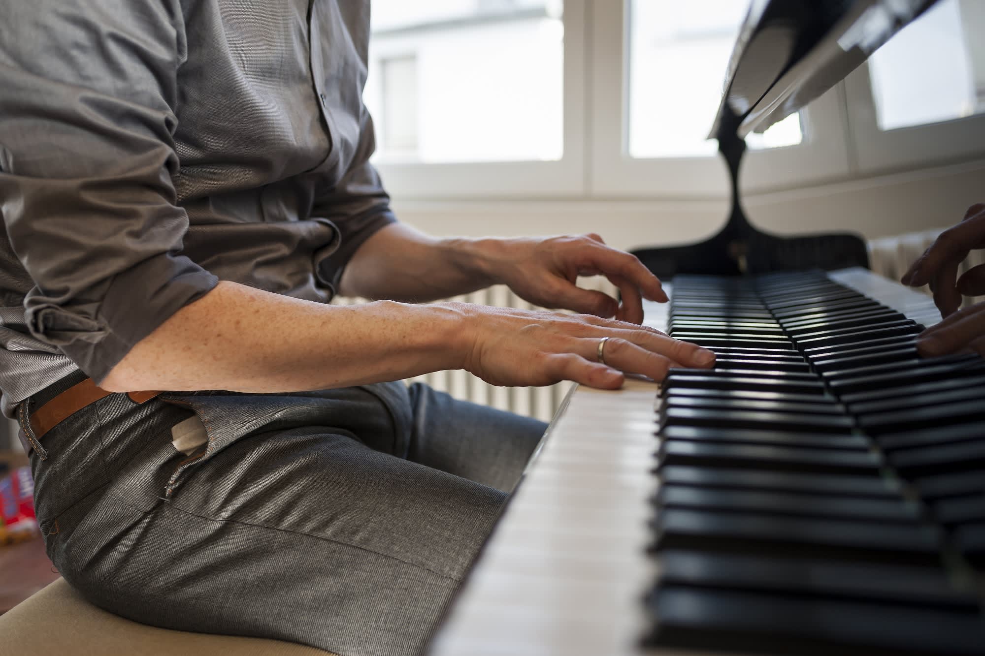 Men playing piano with their penis