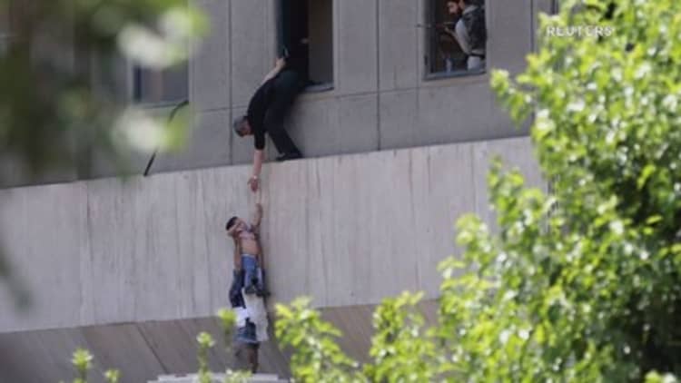 Attackers bomb Iran parliament and mausoleum, at least 12 dead: Iranian media