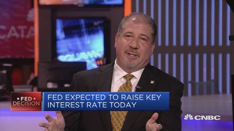 Big questions are how fast and how much Fed rates rise by: EY global CEO