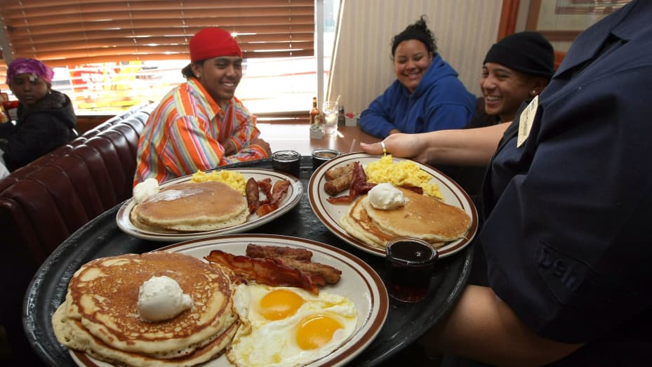 Denny's waitress delivers free Grand Slam breakfasts to customers
