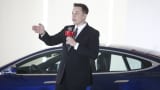 Elon Musk, Chairman, CEO and Product Architect of Tesla Motors, addresses a press conference to declare that the Tesla Motors releases v7.0 System in China on a limited basis for its Model S, which will enable self-driving features such as Autosteer for a select group of beta testers on October 23, 2015 in Beijing, China.