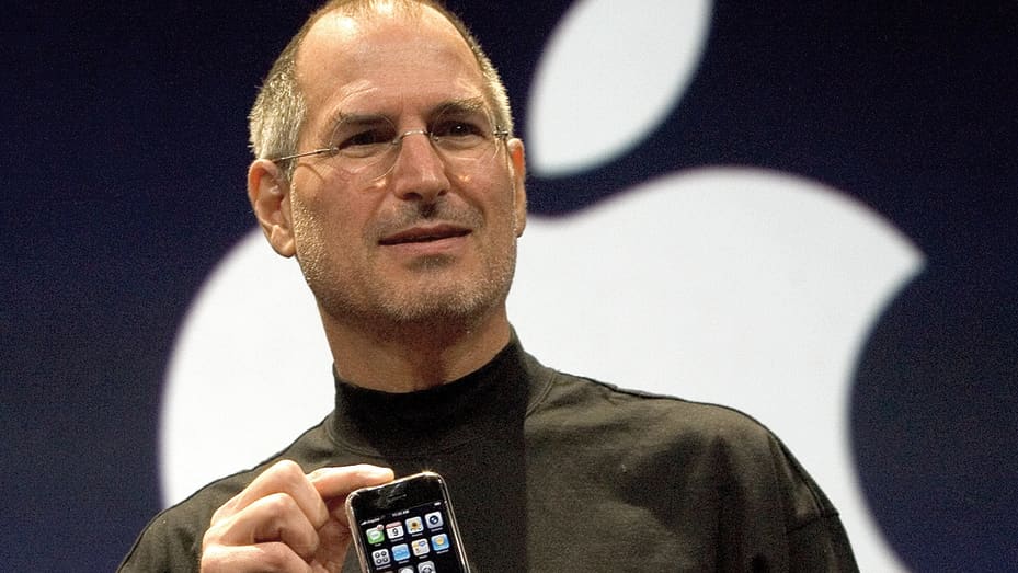 The late Steve Jobs, Apple founder and former CEO, introduces the iPhone at a conference in 2007.