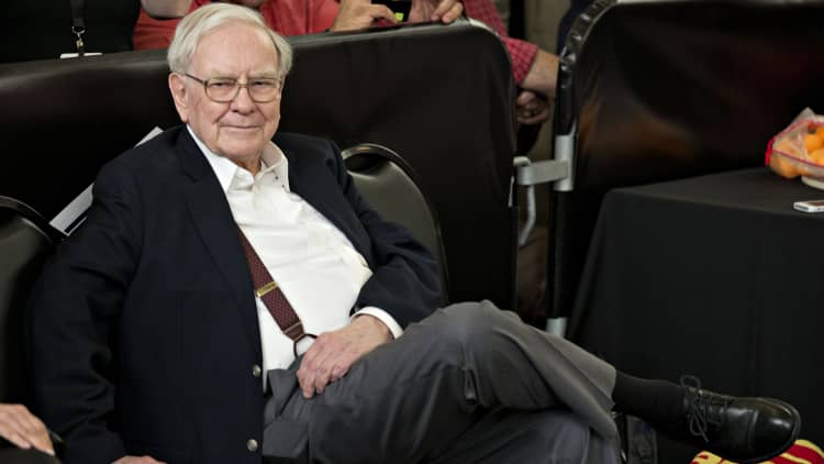 Warren Buffett is worth $75 billion but says he would be 'very happy' with way less