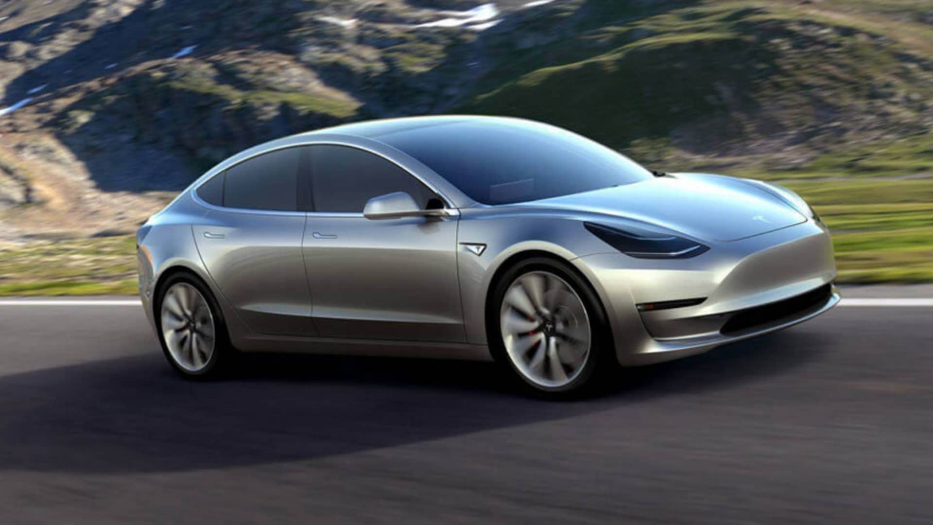 Tesla delivers first Model 3 cars, here's what it's like behind the wheel