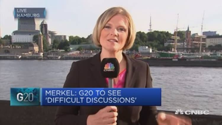 Merkel aims to rally world leaders behind her at G-20 summit in Hamburg