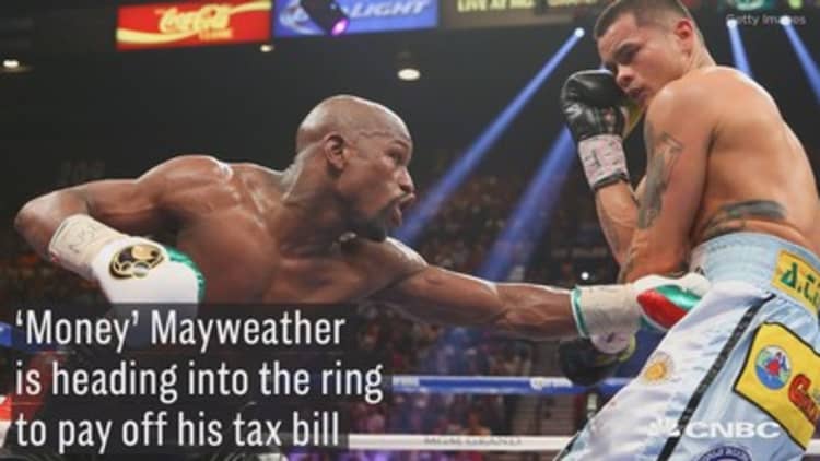 Mayweather is heading into the ring to pay off his tax debt