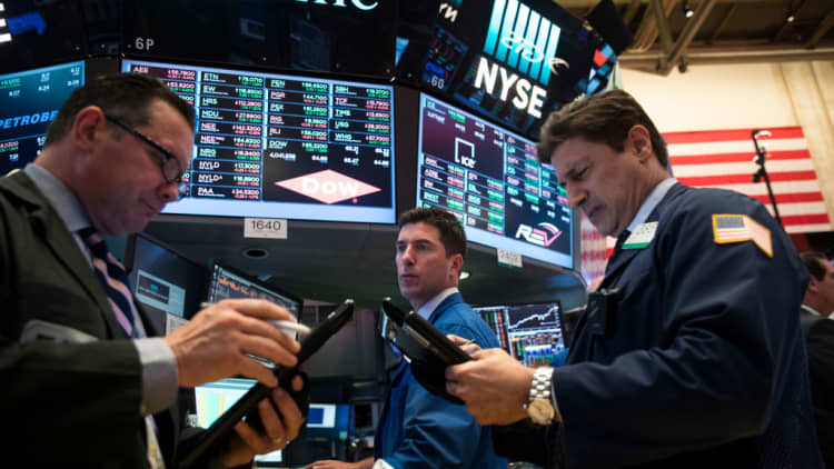 Traders track market sentiment as stocks hit record highs
