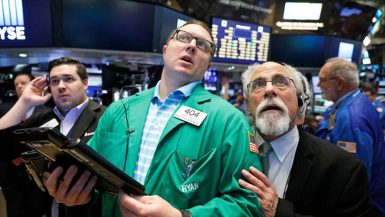 Stocks attempt rebound amid slew of earnings