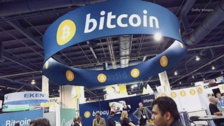 This hot digital currency trend is minting millions, but US investors aren't allowed to play