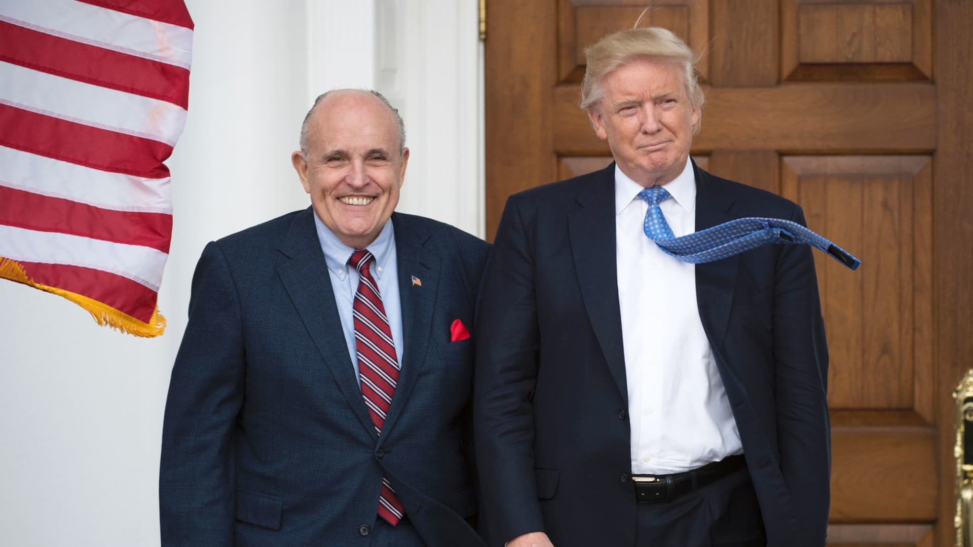 Then-President-elect Donald Trump meets with former New York City Mayor Rudy Giuliani at the clubhouse of Trump National Golf Club November 20, 2016 in Bedminster, New Jersey.