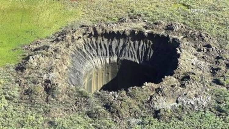 Mysterious craters blowing out of Russia could mean trouble for the whole planet