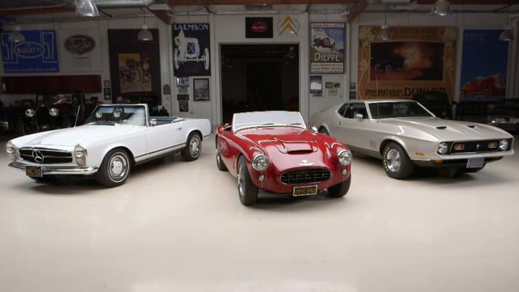 Jay Leno appraises a '67 Mercedes-Benz, '59 Austin-Healey and a '71 Ford Mustang