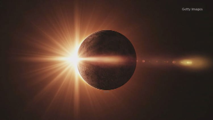 Towns in the path of the eclipse hope it will shine on bottom line