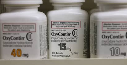 OxyContin maker stops promoting opioids, cuts sales staff